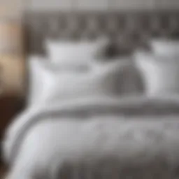 Elegant gray and white comforter set on a full bed