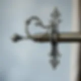 Stylish Pewter Bracket Design Elegant pewter curtain rod bracket showcasing intricate design.