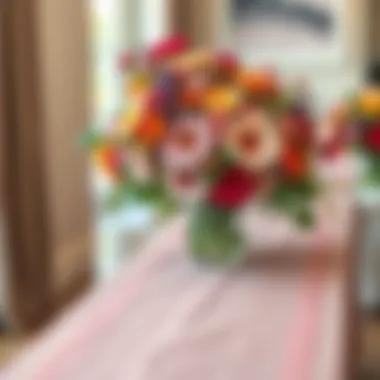 Vibrant floral centerpiece atop a sheer table runner