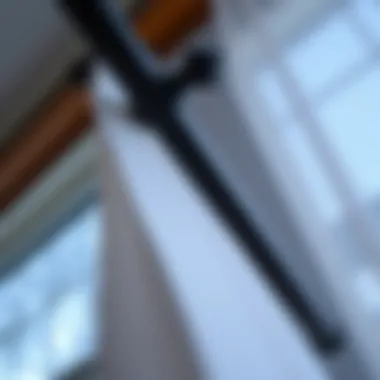 Close-Up of Sunroom Curtain Rod Installation Close-up of a sunroom curtain rod installation