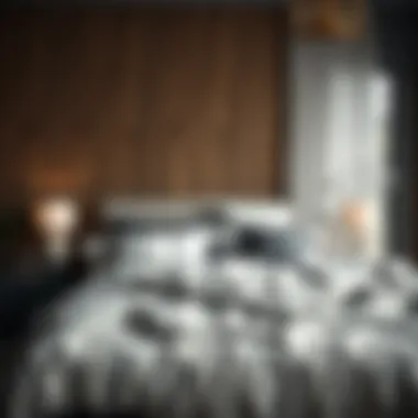 Serene bedroom ambiance featuring grey and white duvet arrangement