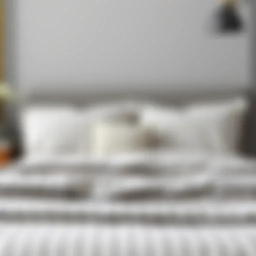 Elegant gray striped bedding set on a neatly made bed