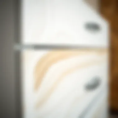 Close-up view of the rich wood grain on a white dresser